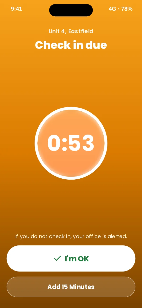 Amber full screen reminder with the time left, a large I’m OK button and an Add 15 minutes button.